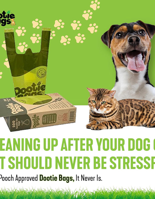 Load image into Gallery viewer, Dootie Bags® Medium-Large Poop Bags, 100 Count, with Tie Handles and Gussets. Strong and Leakproof. Made with Corn Starch. Fits  Pooper Scoopers.
