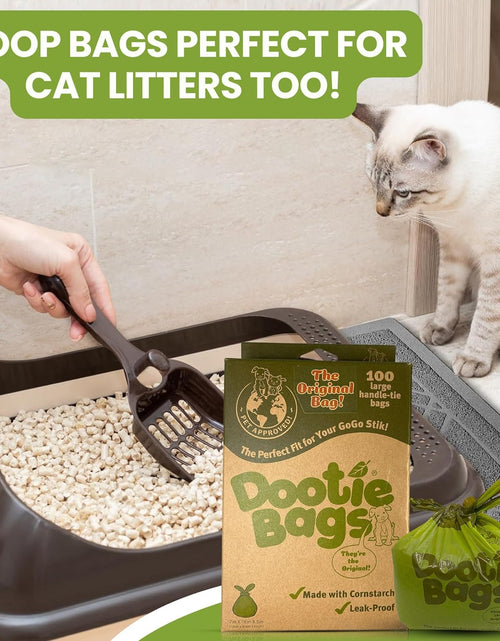 Load image into Gallery viewer, Dootie Bags® Medium-Large Poop Bags, 100 Count, with Tie Handles and Gussets. Strong and Leakproof. Made with Corn Starch. Fits  Pooper Scoopers.
